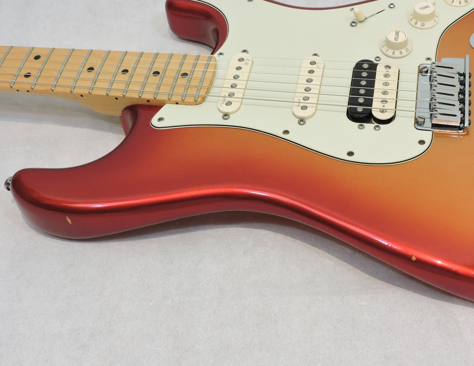 Fender American Deluxe Stratocaster HSS Shawbucker™. Sunset Metallic - Used