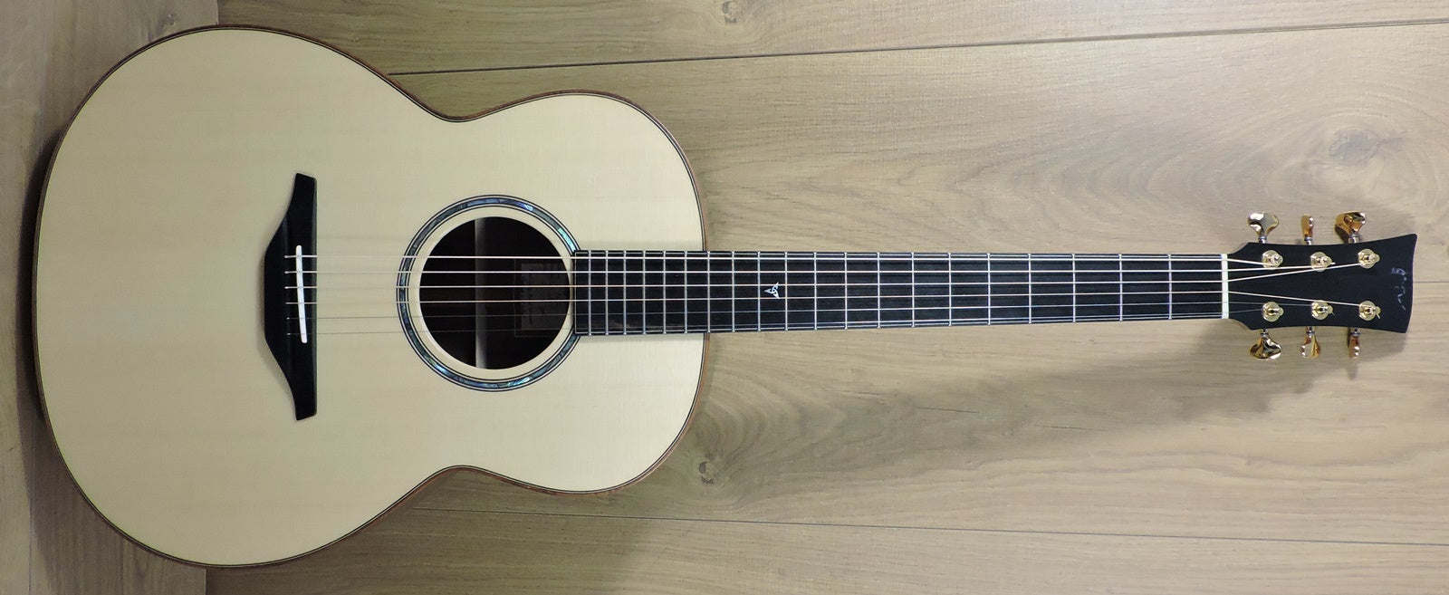 McIlroy A62. Engelmann Spruce top with Claro Walnut Back and Sides