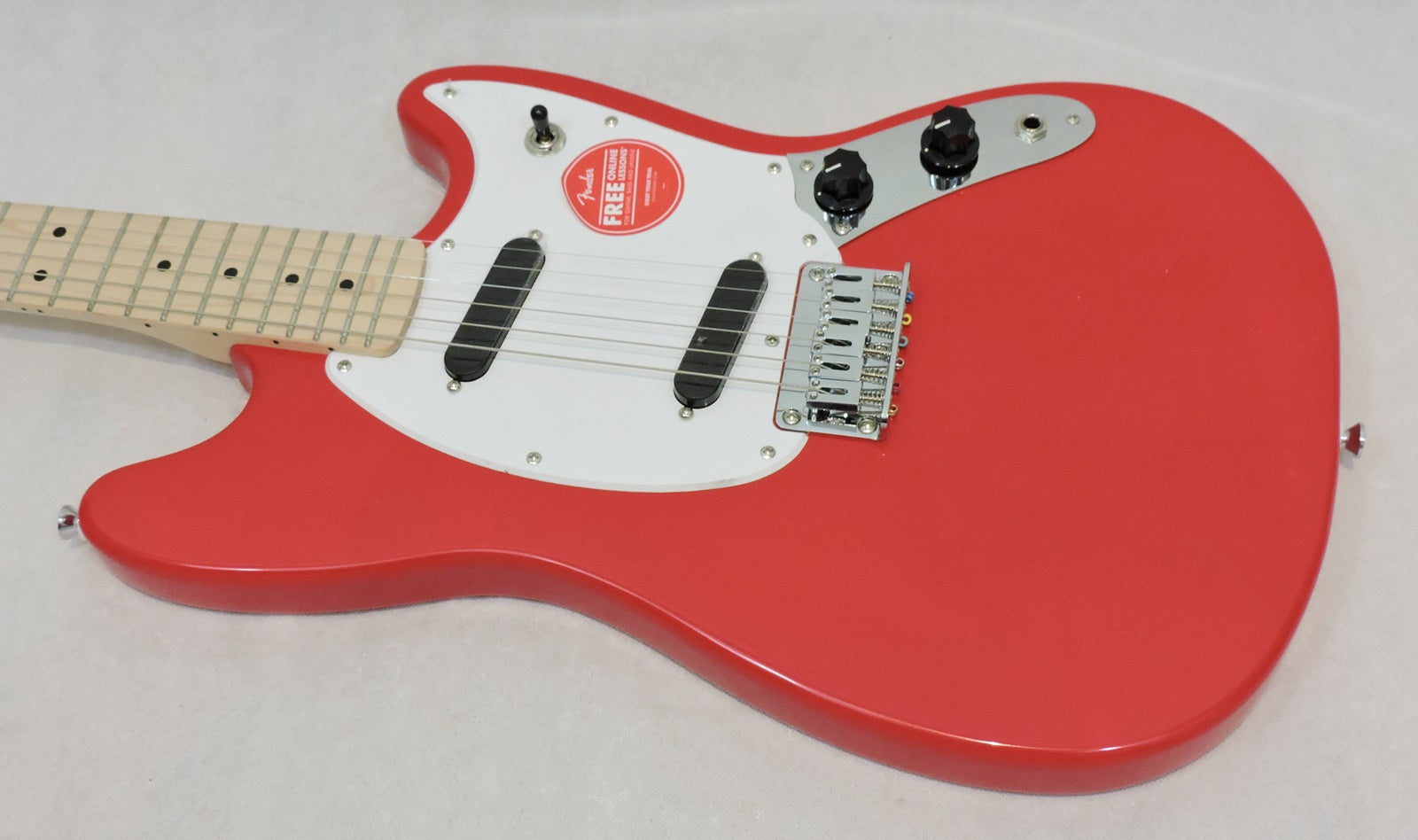 Squier Sonic™ Mustang® HH. Torino Red